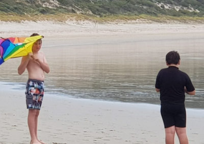 Flying a kite on Great Ocean road beach