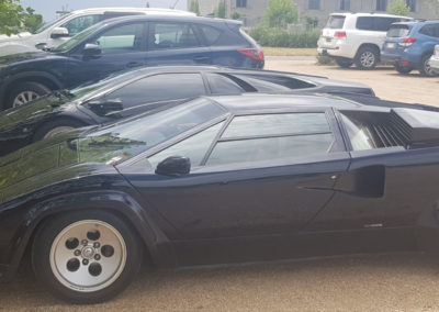 Black sport car along Great Ocean Road