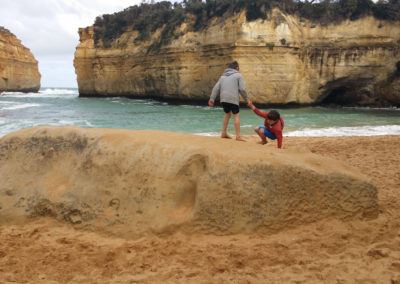 Climbing on rocks at Loch Ard Gorge